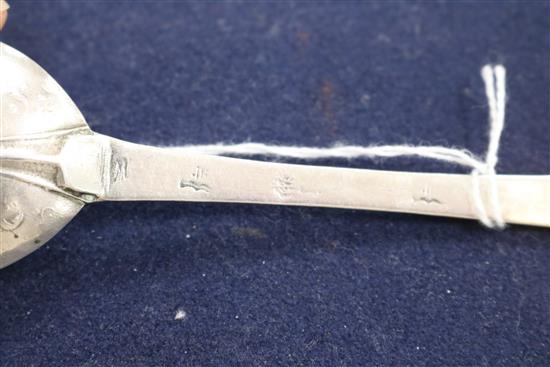 A late 17th century silver lace-back trefid spoon,